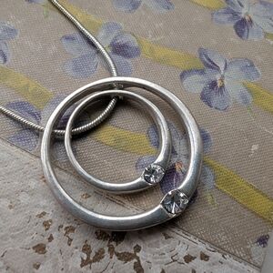 Silver Double Circle Pendant Necklace with Crystal Accents